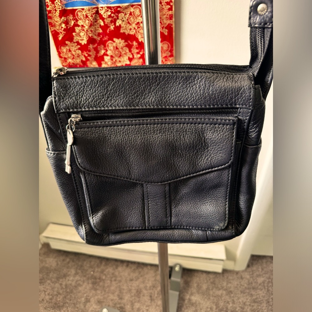 Fossil black leather vintage crossbody purse with built in wallet.